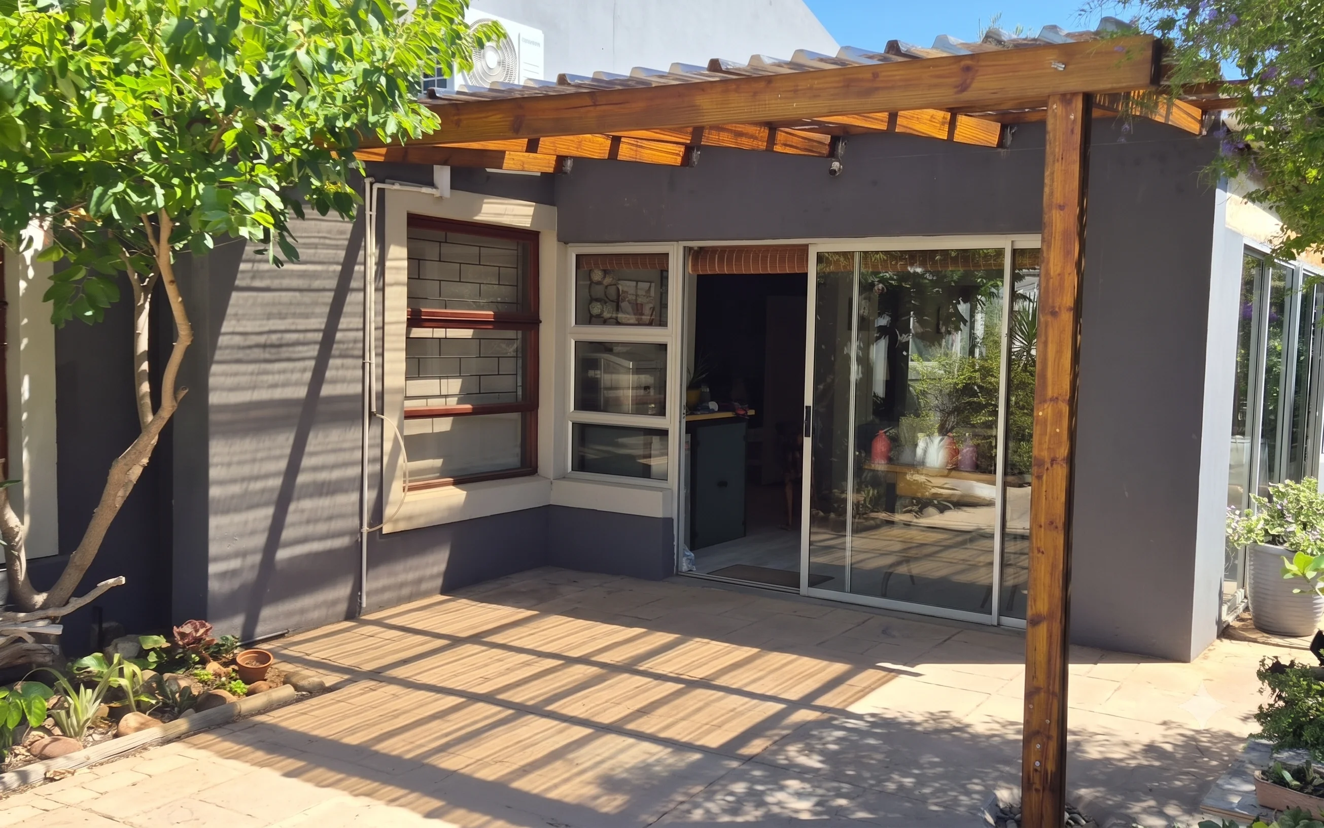 Finished Clear Roofing & Timber Decking Structure